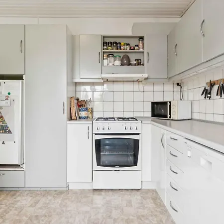 Family Near Beach, Town And Nature