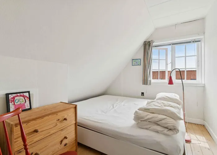 Family Near Beach, Town And Nature