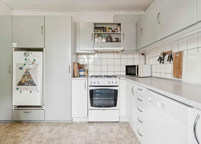 Family Near Beach, Town And Nature